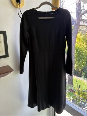Turnover Black wool Long-Sleeve A-Line Dress from the Netherlands